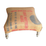 Ottoman pouf rests foot