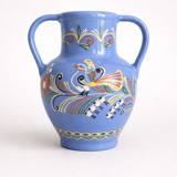 Glazed blue ceramic vase with folk decoration
