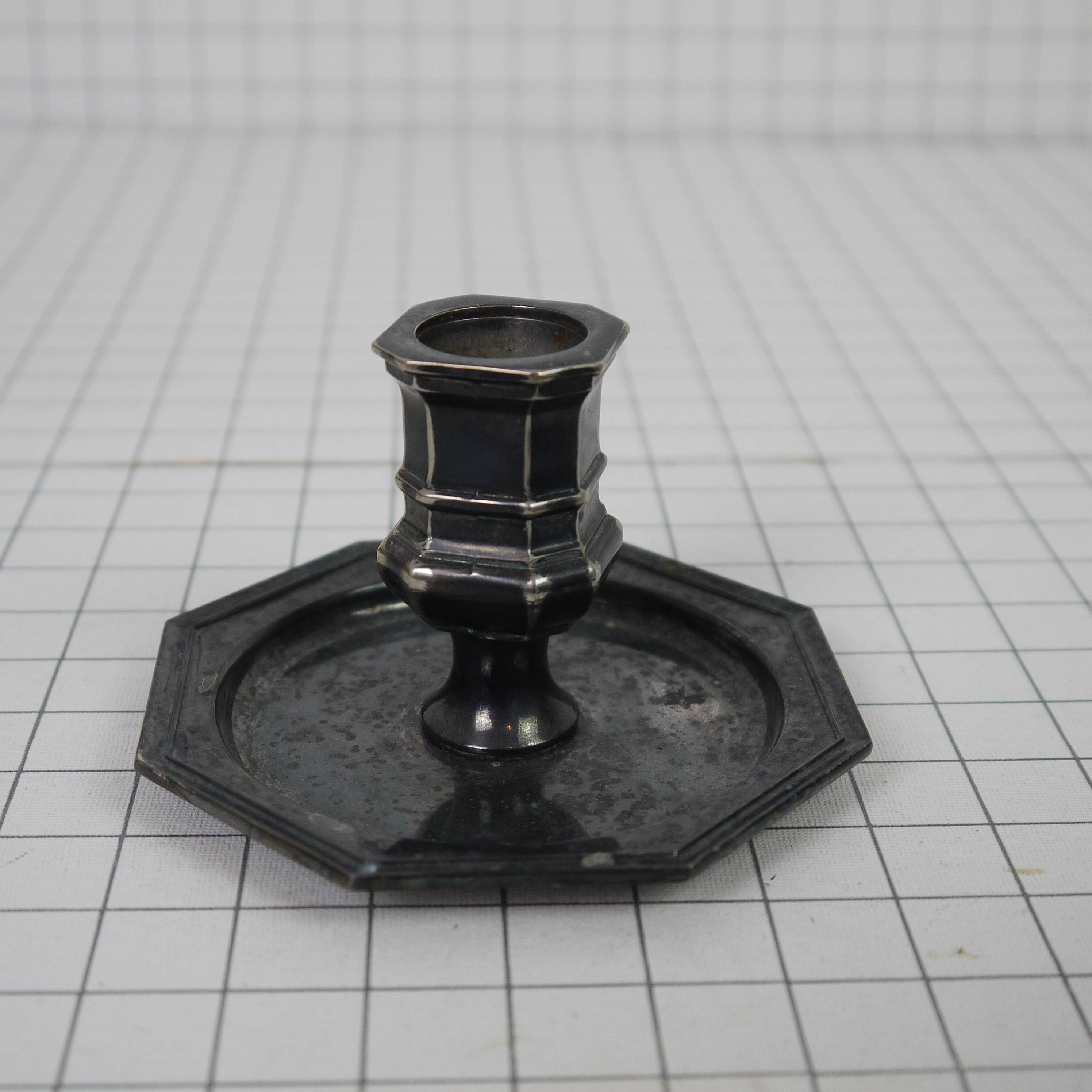 Pair of metal candlesticks