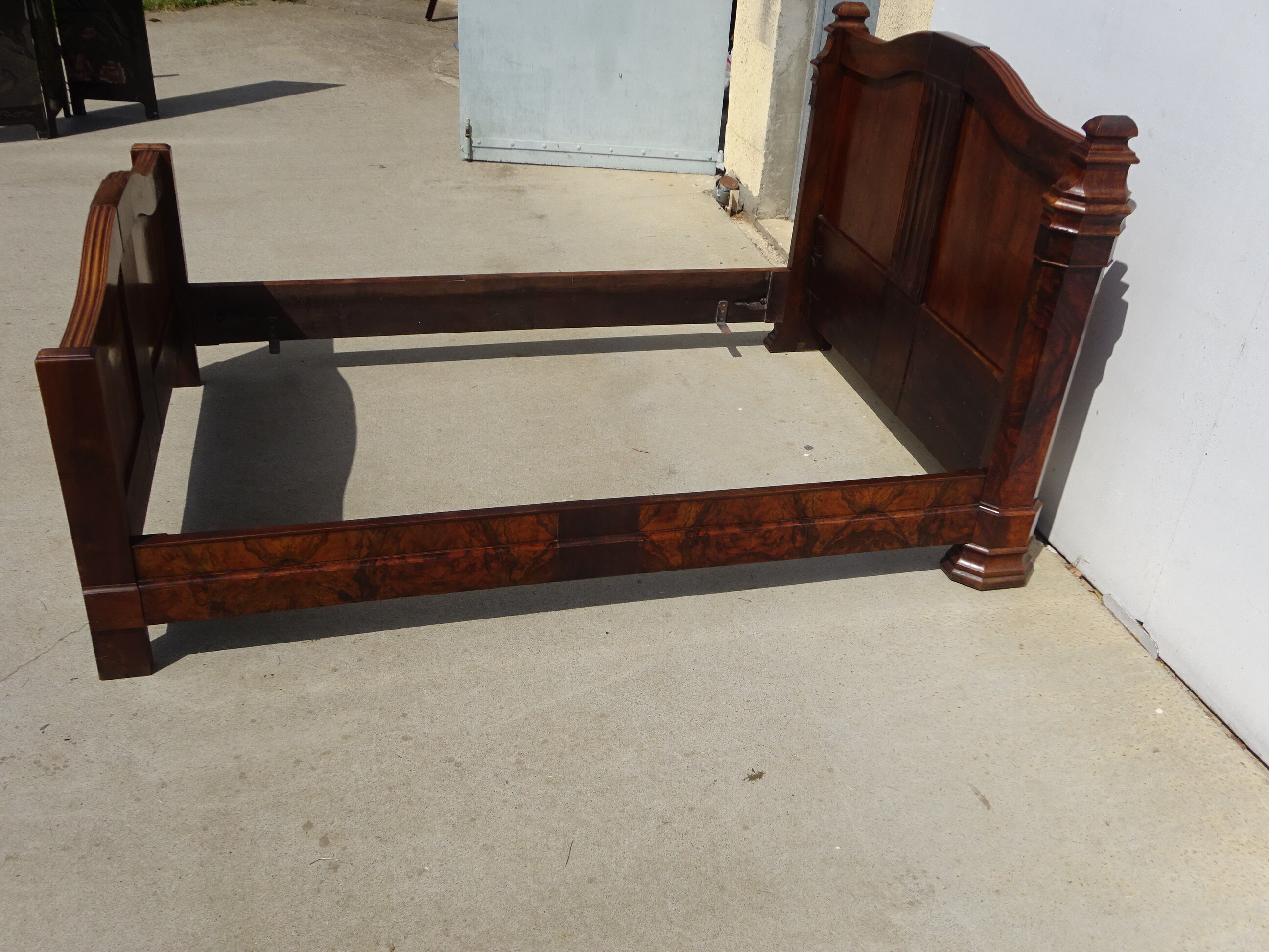 Walnut bed and walnut magnifying glass nineteenth century
