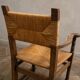 Rustic armchair made of woven rush, 1960s–1970s.