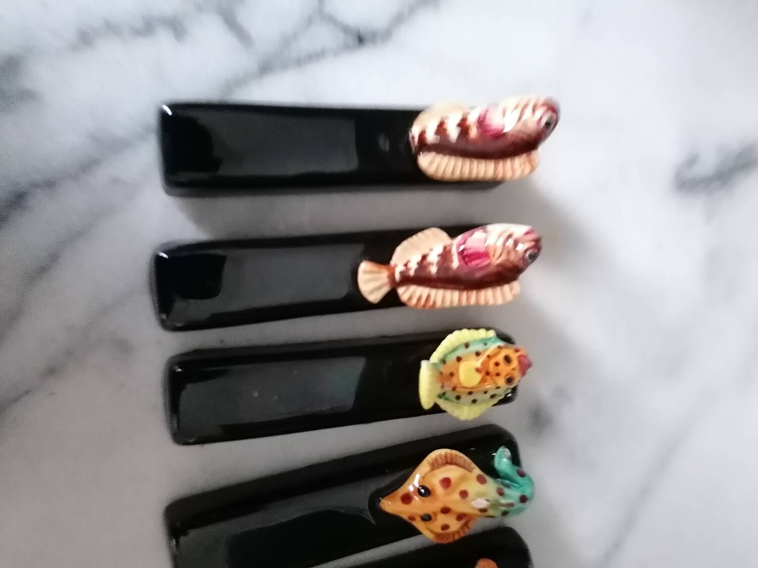 Vintage fish slip knife holders