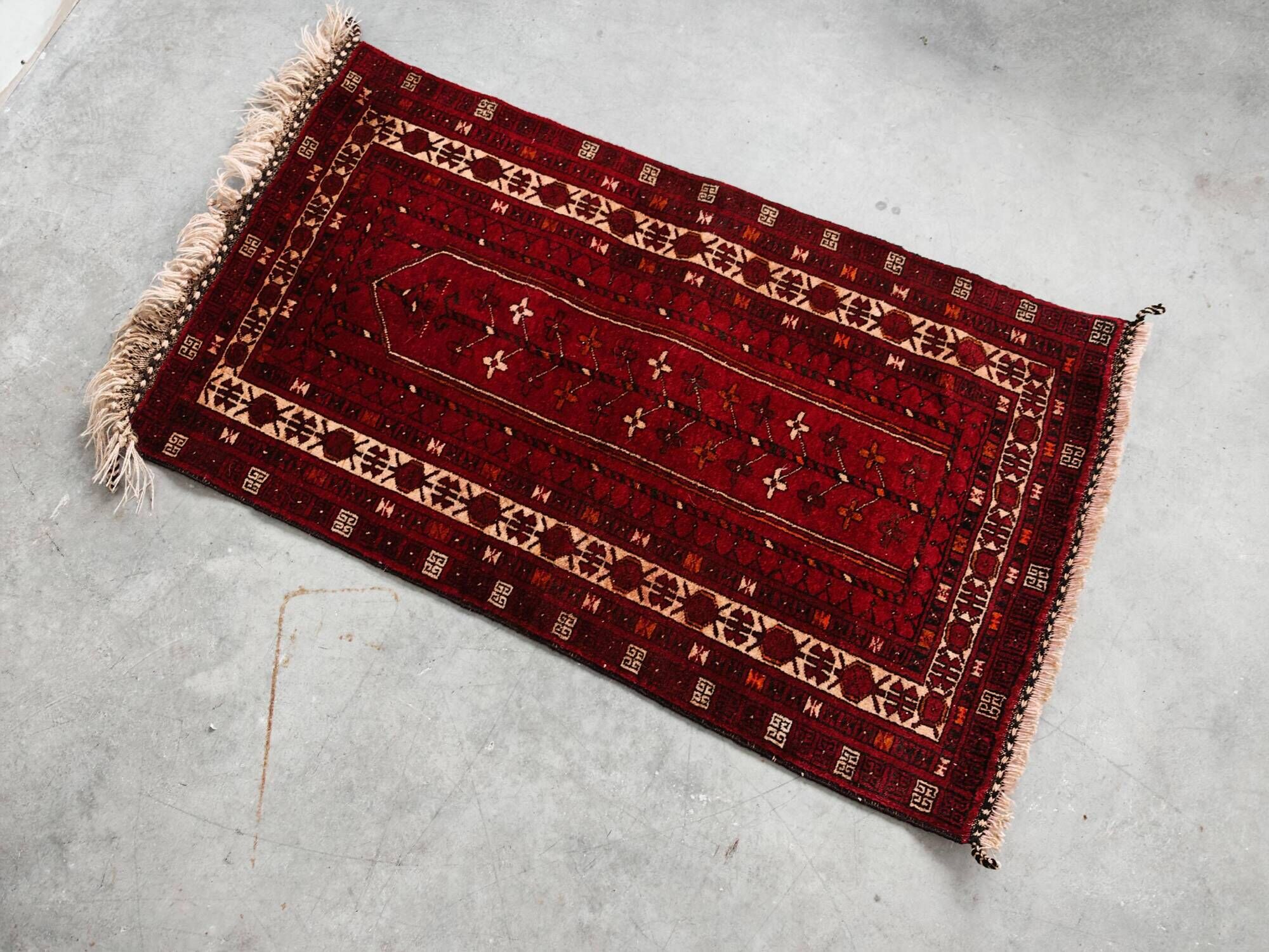 Vintage Afghan tribal prayer rug, hand-knotted from the 1950s.
