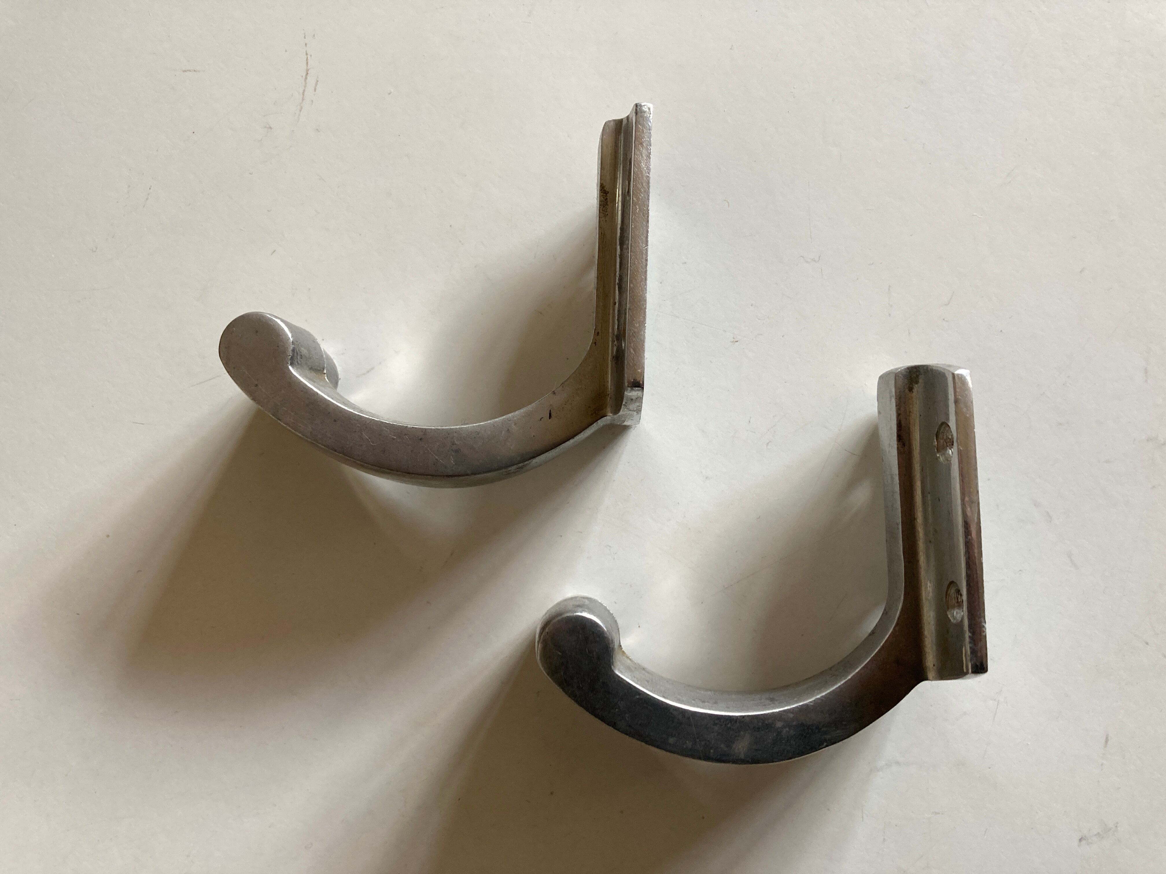 Pair of bathroom pads made of art deco aluminum cast iron