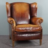 Armchair in patinated sheepskin leather