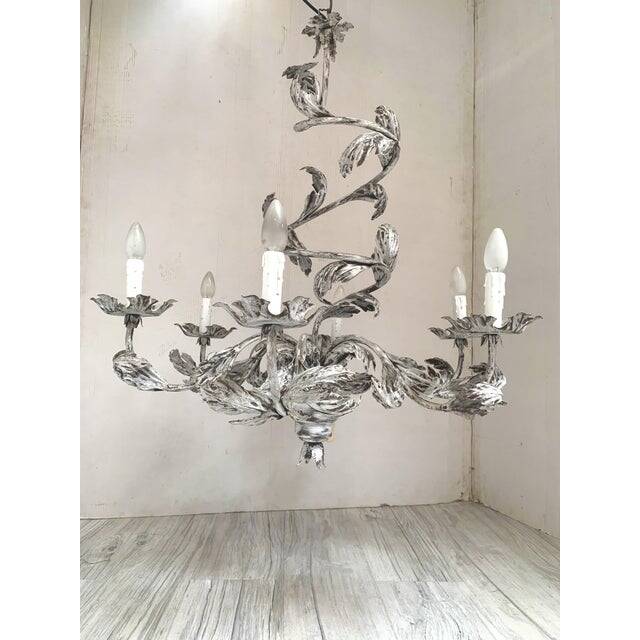 Contemporary brunish-clay florentine wrought iron leafs chandelier