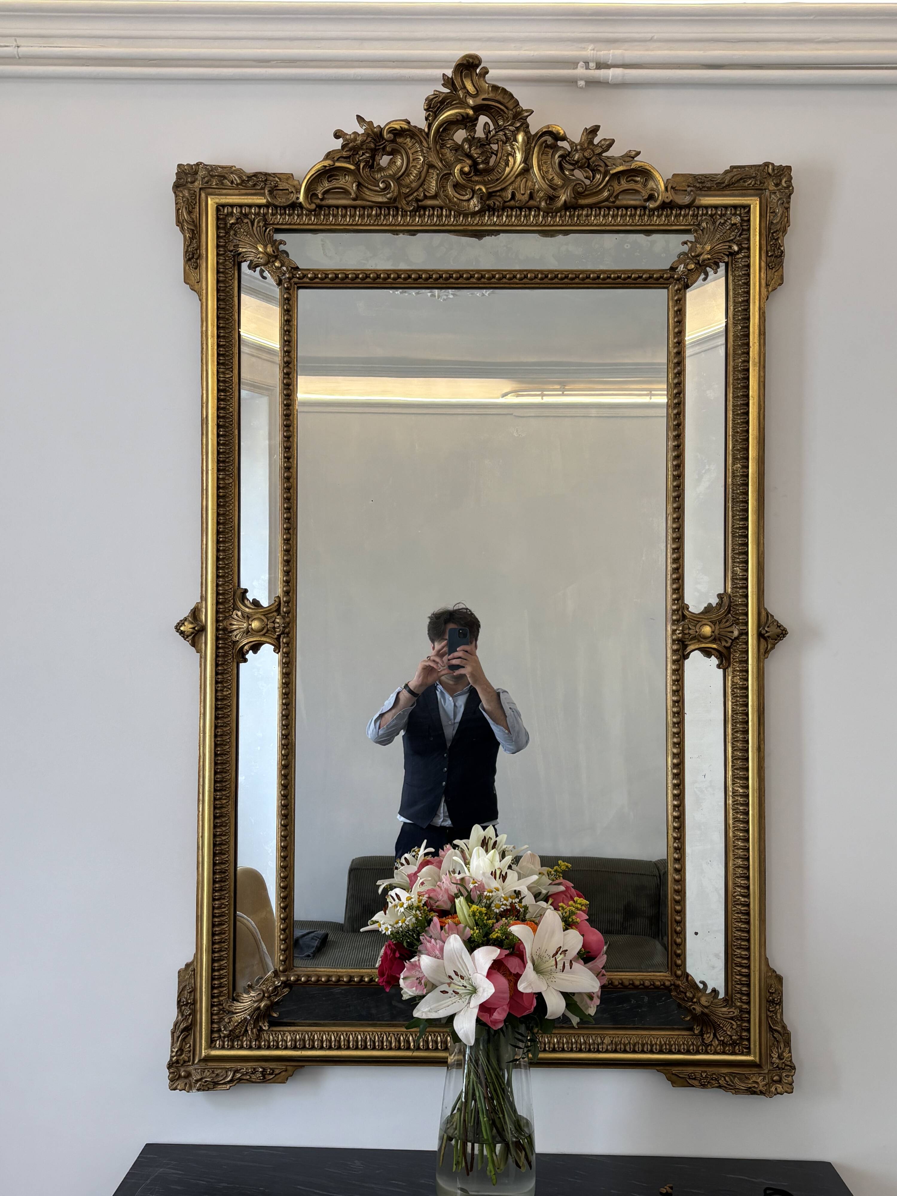 Louis XV style mirror with moulded gilded wood and stucco from the Napoleonic III era.