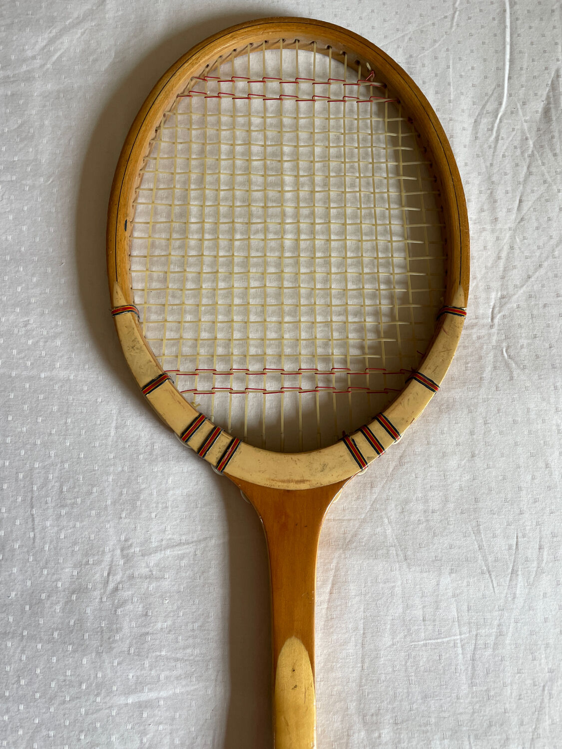 Vintage blond wood tennis racket