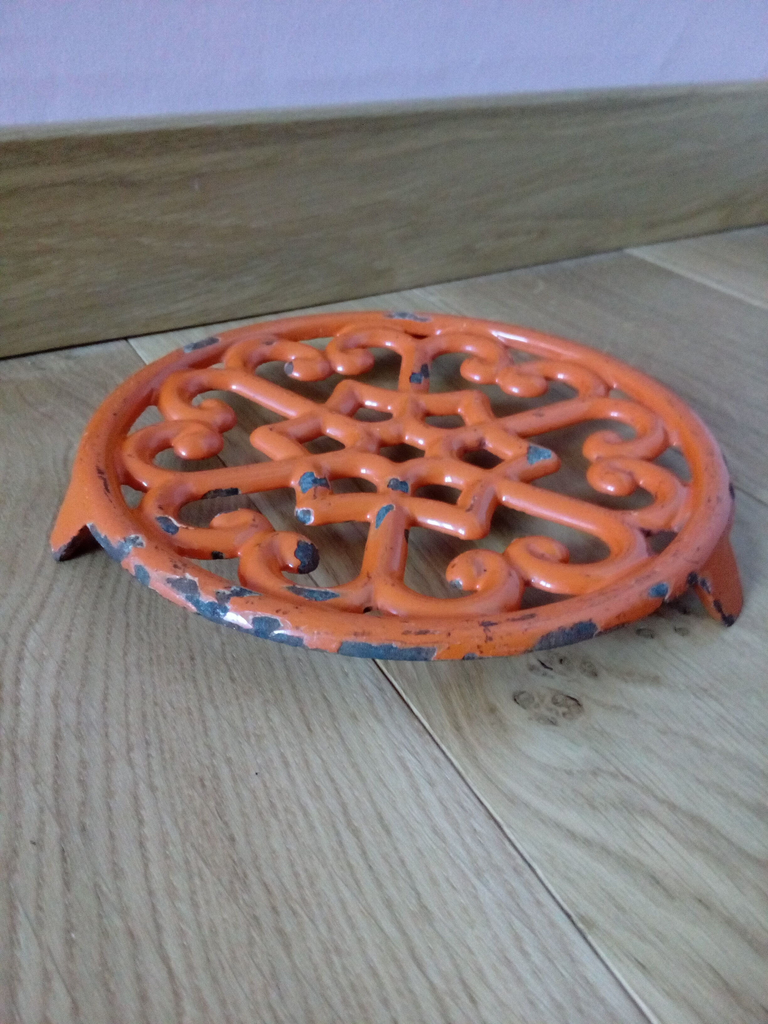 Orange enamelled cast iron dish