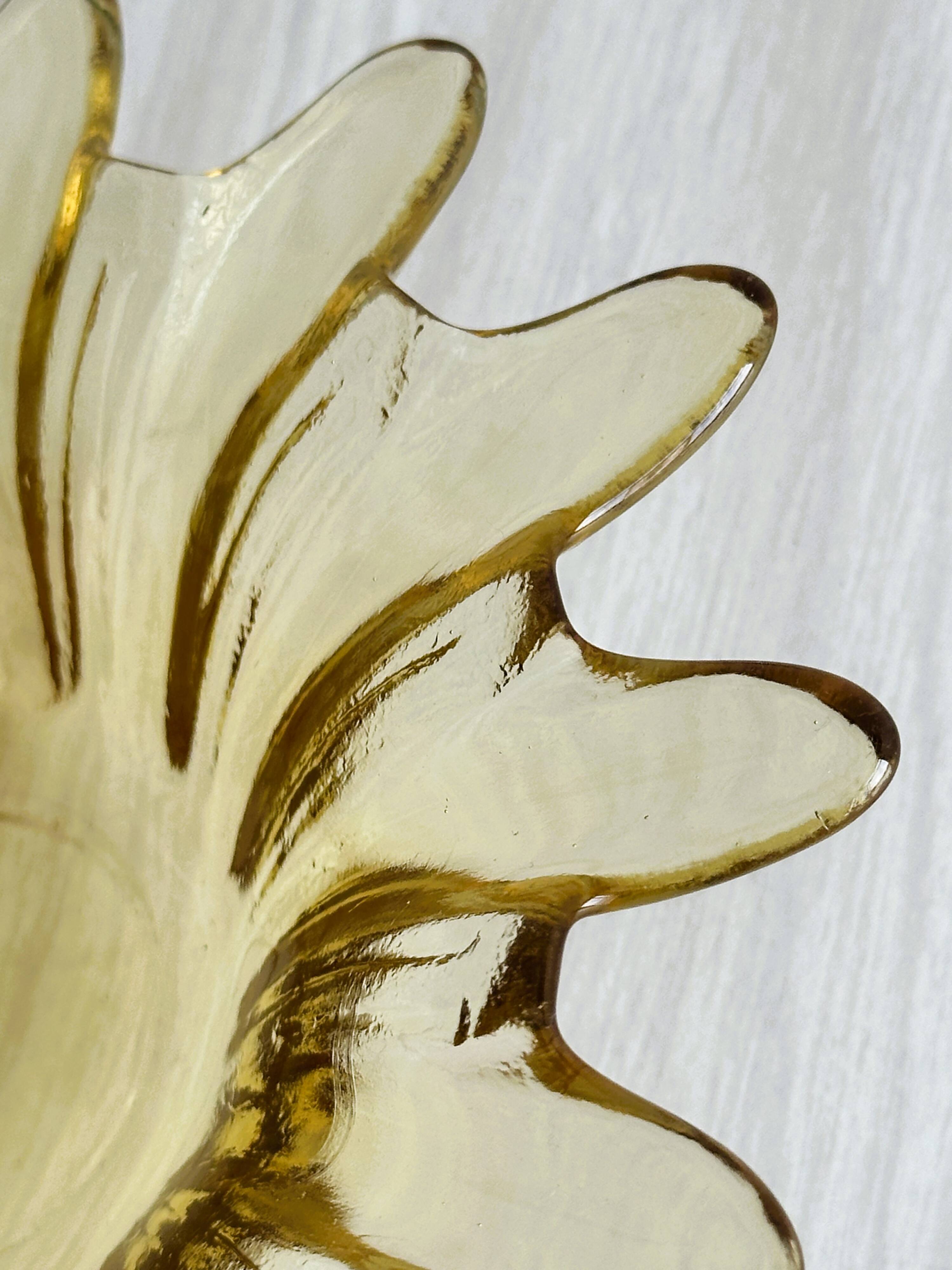 Yellow translucent blown glass pocket emptier