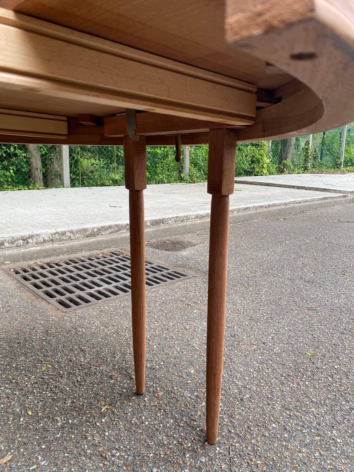 Round extendable dining table in solid mahogany from the 1930s.