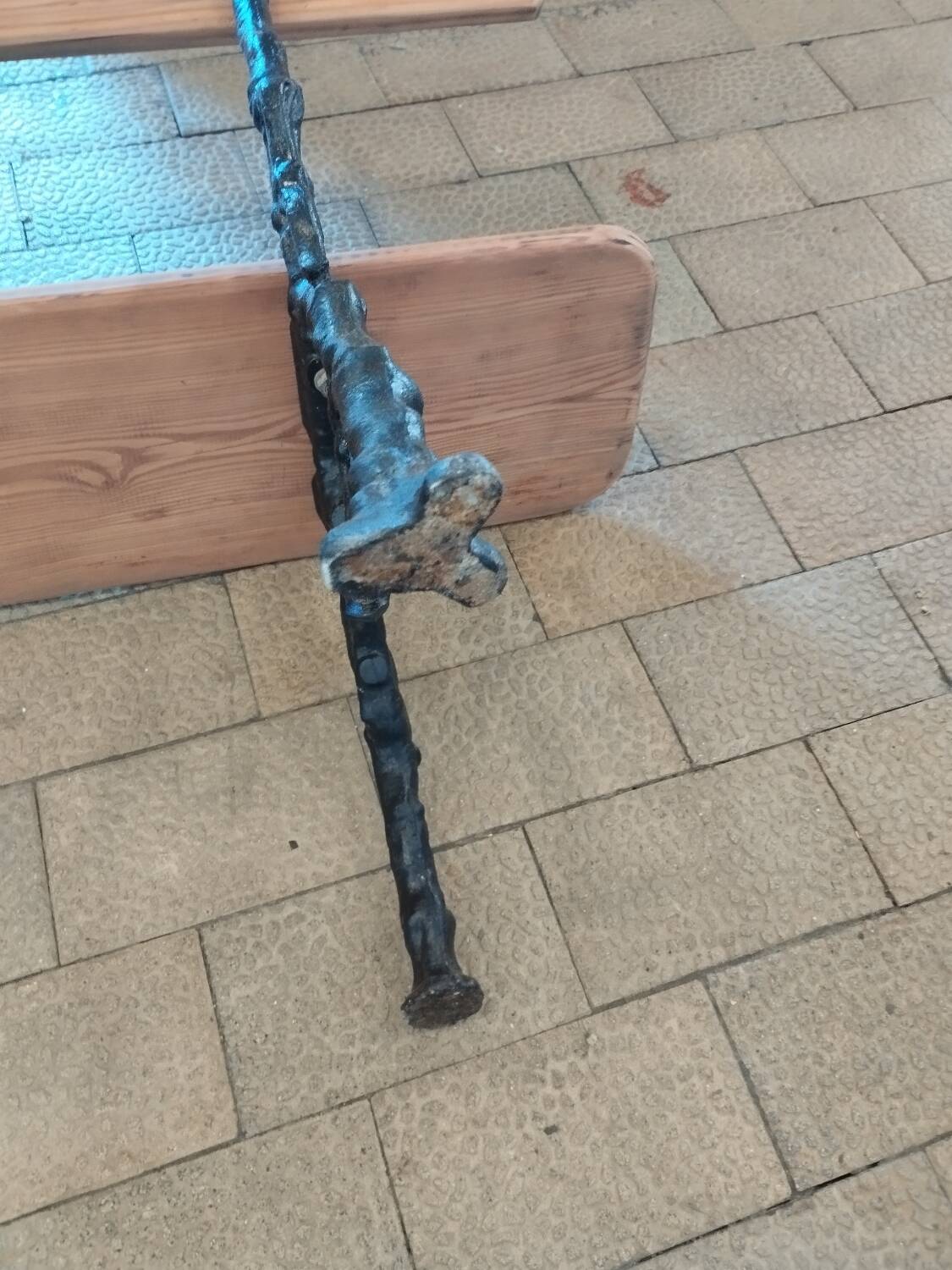 Antique garden bench with cast iron legs