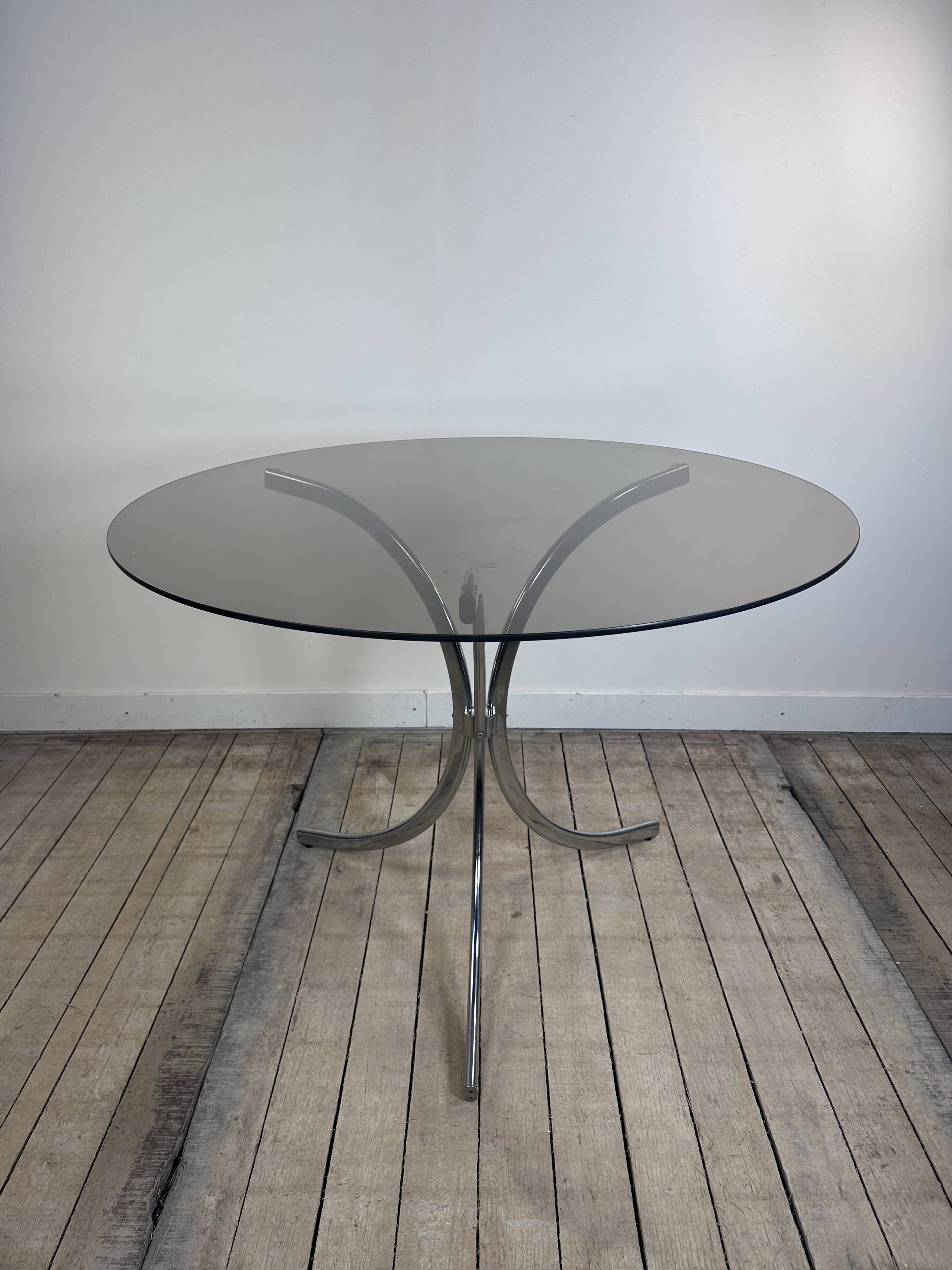 Vintage 1970s round metal and smoked glass table