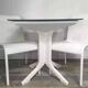 White woven resin garden chair