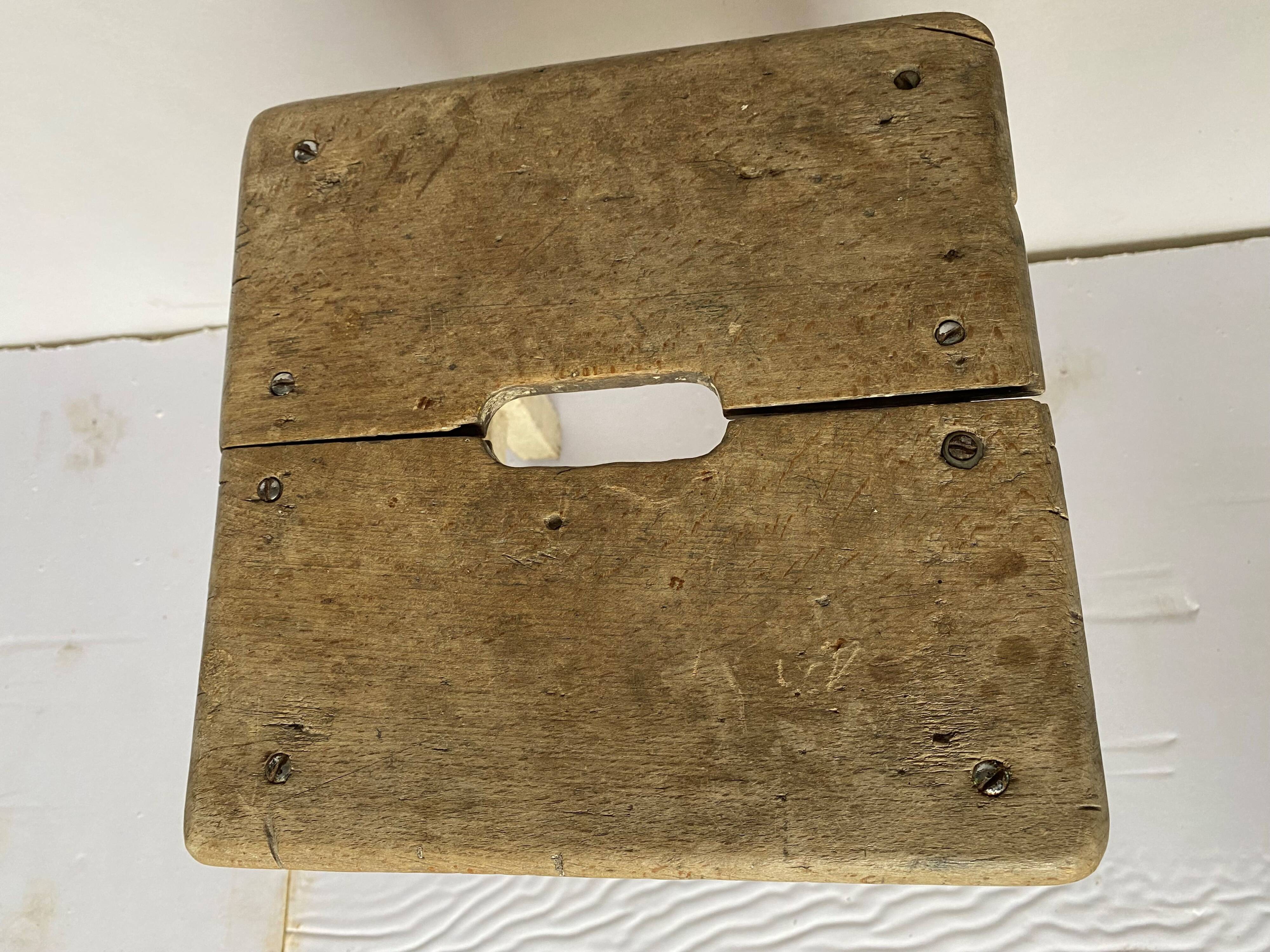 Wooden workshop stool from the 1950s