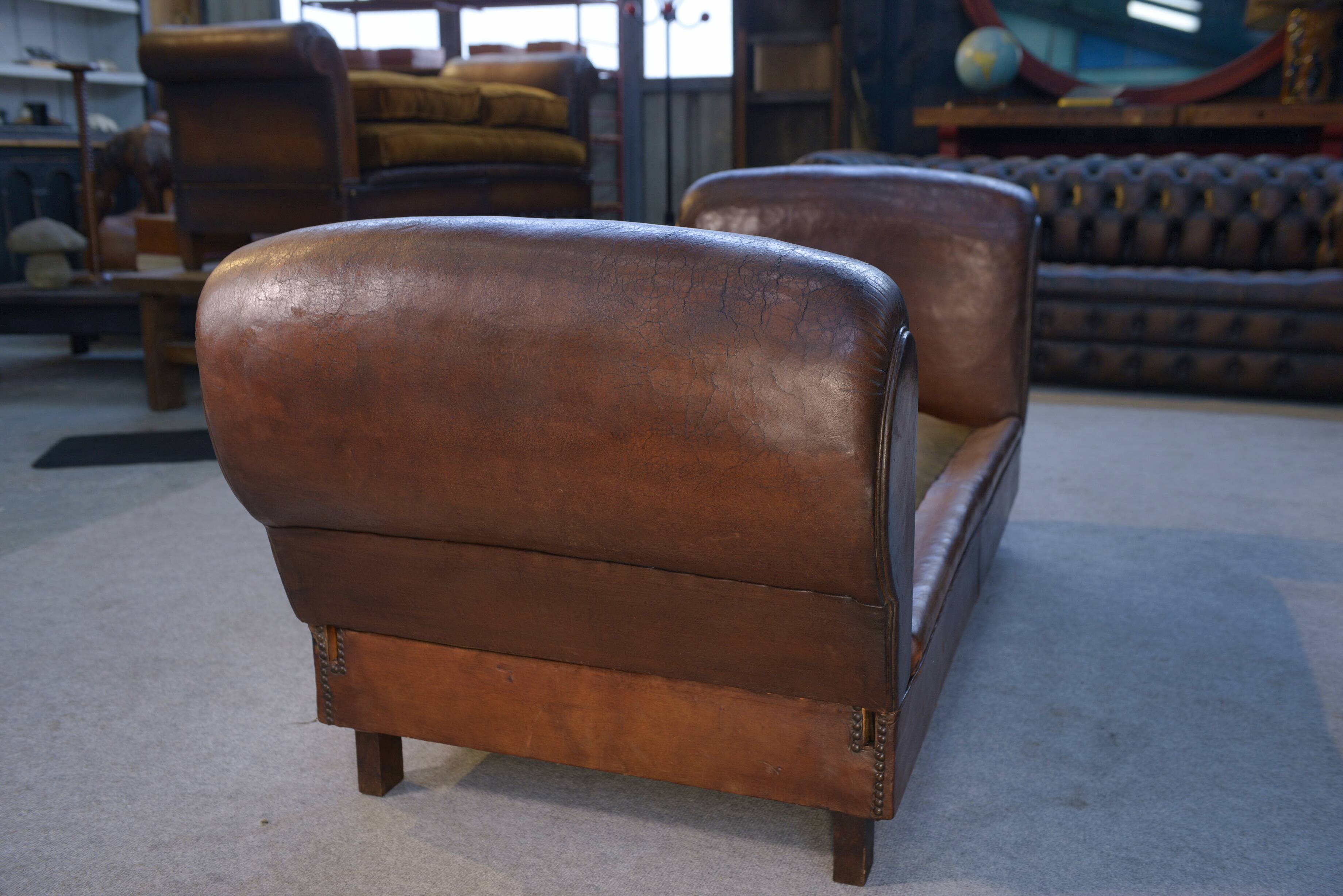 1920s convertible leather club bench with velvet seats