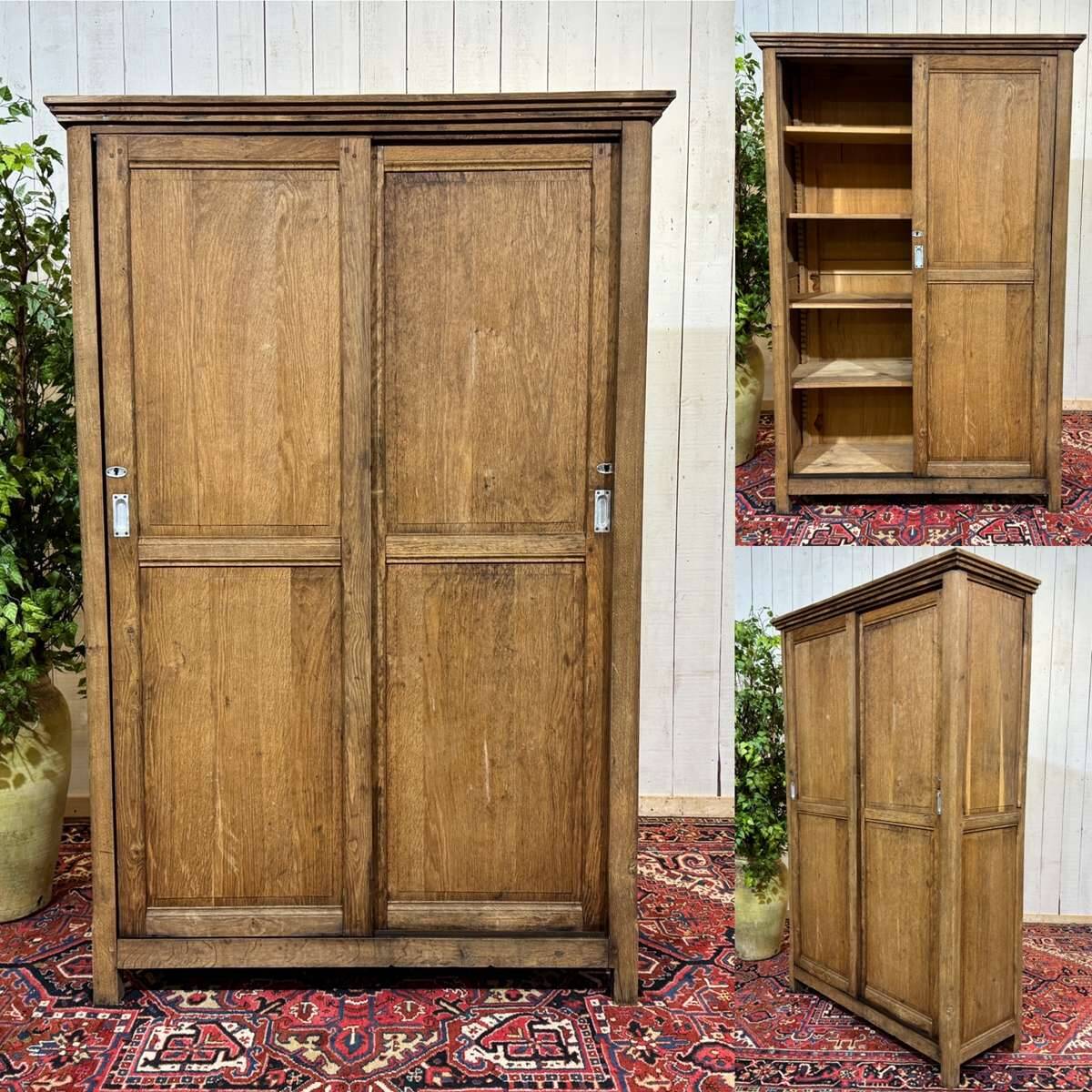 Oak wardrobe with sliding doors from the 1930s.