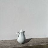 Plain white porcelain teapot