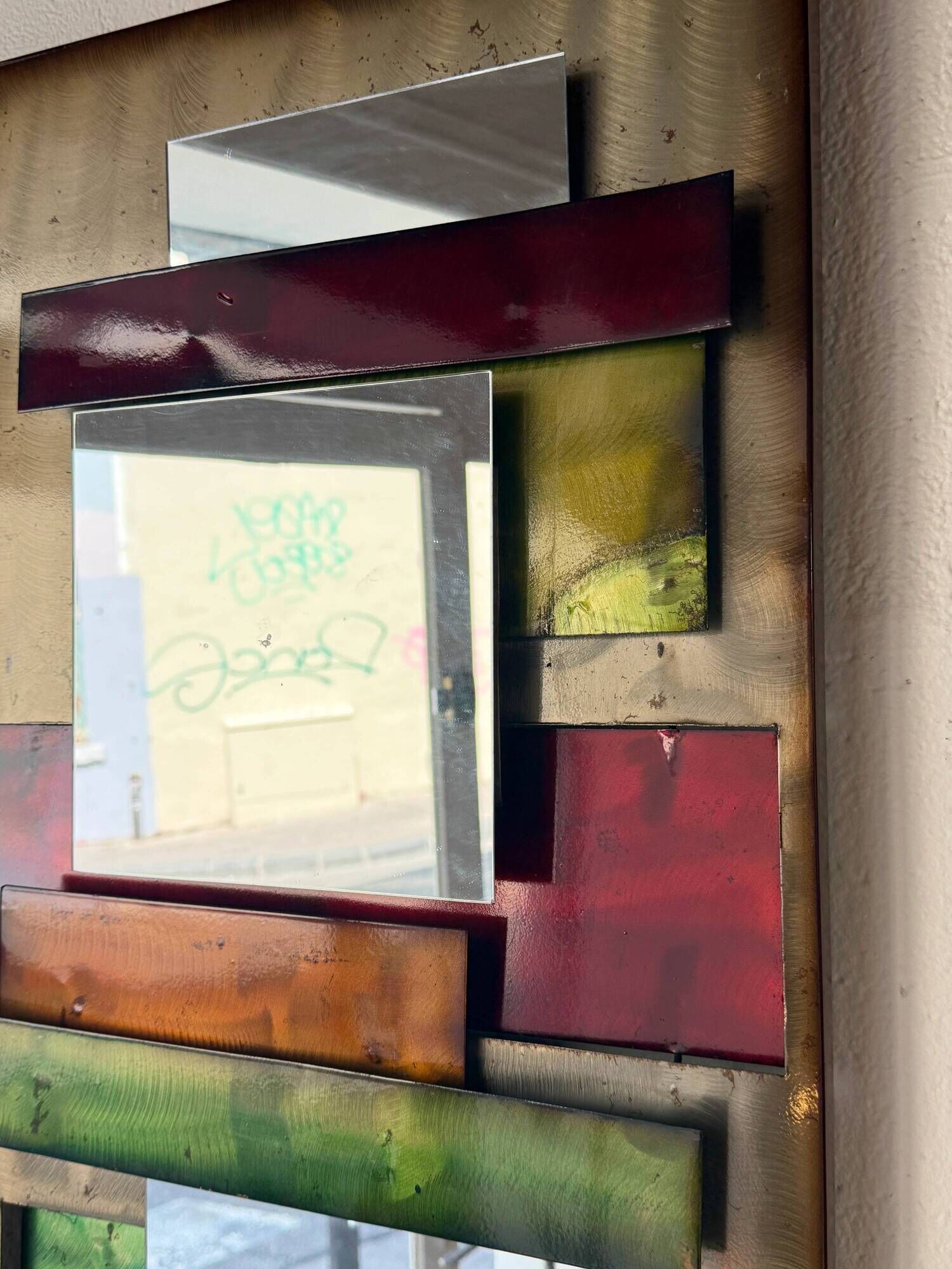 Large metal "polychrome" mirror — 1970s