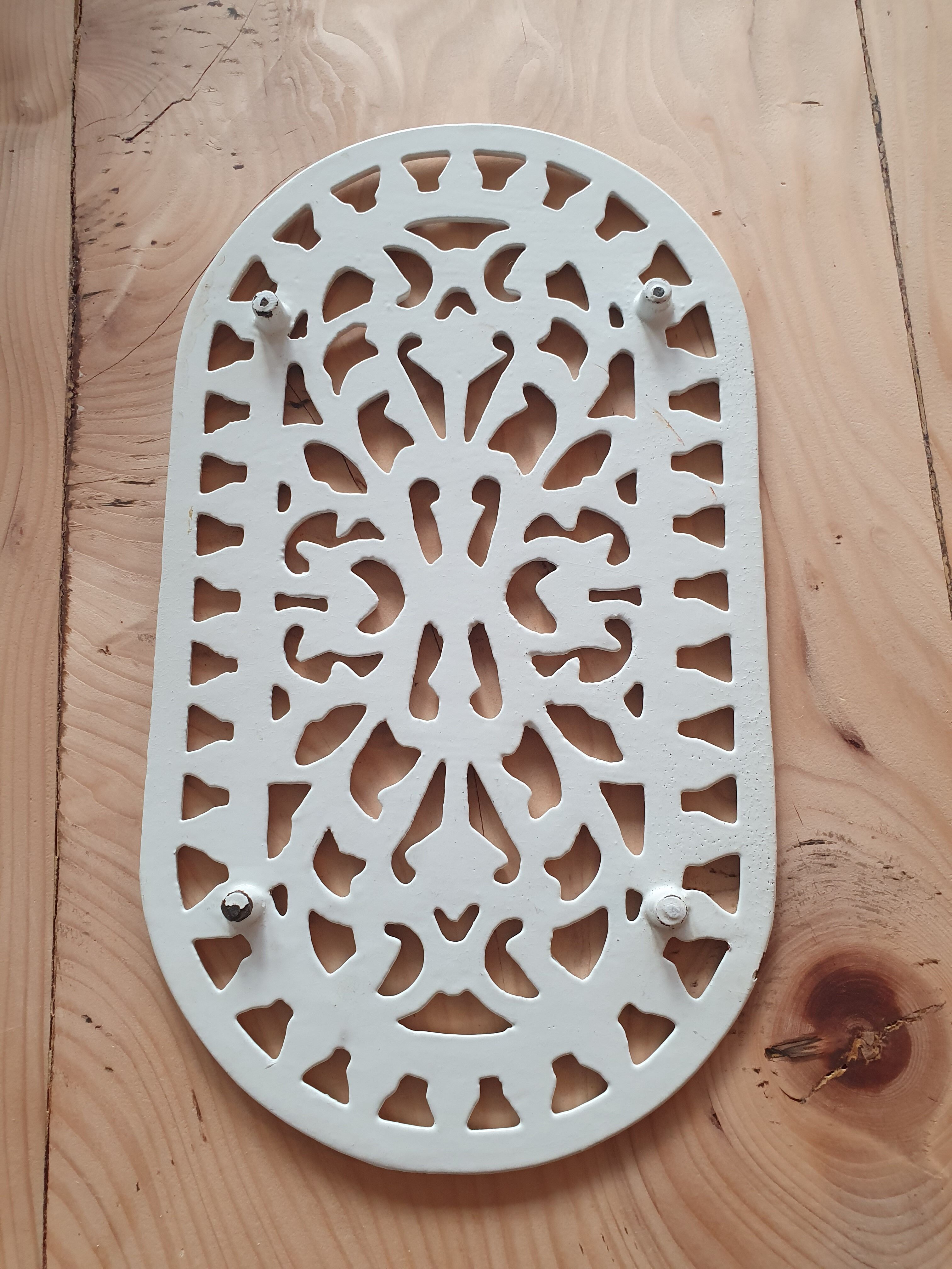Dessous de plat en fonte