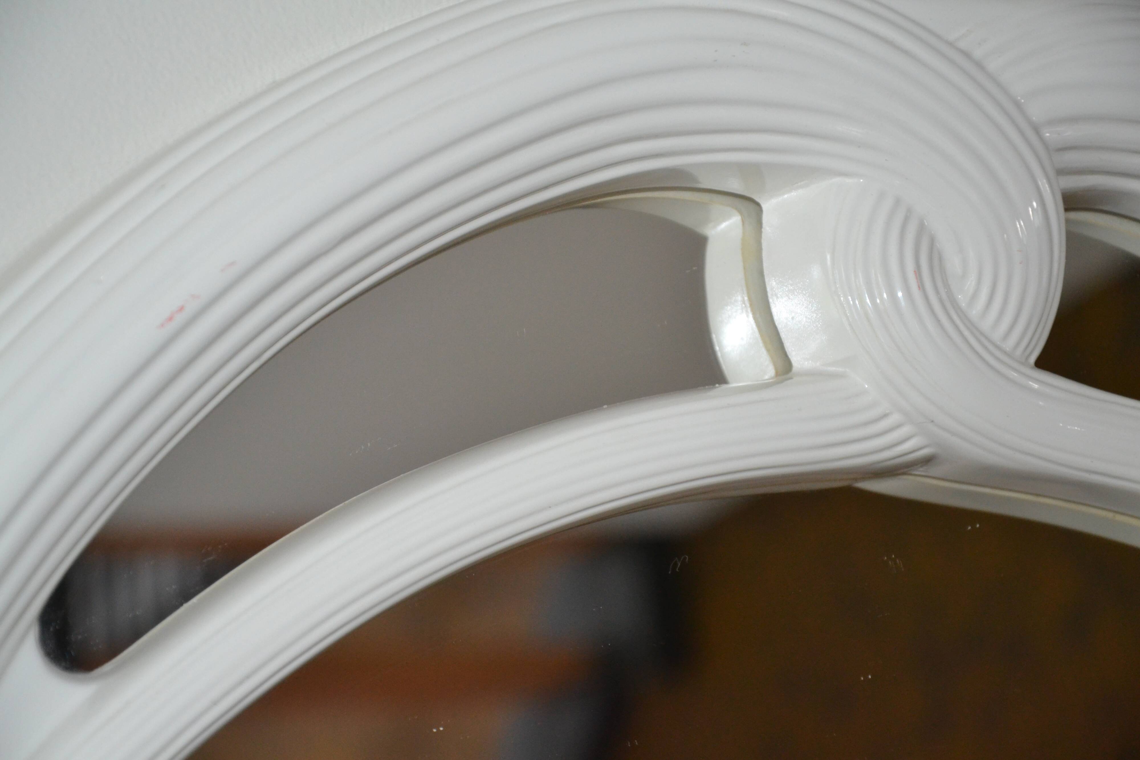 White mirror in 90s Art Deco style
