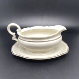 Porcelain sauce boat with black and gold checkered border