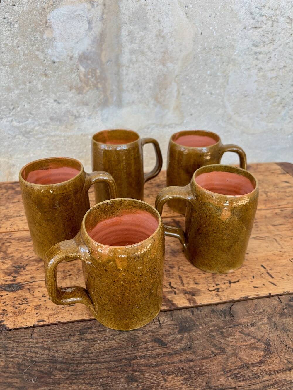 Set of 5 brown stoneware mugs