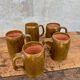 Set of 5 brown stoneware mugs