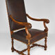 Louis XIII office armchair in leather and walnut carved around 1860