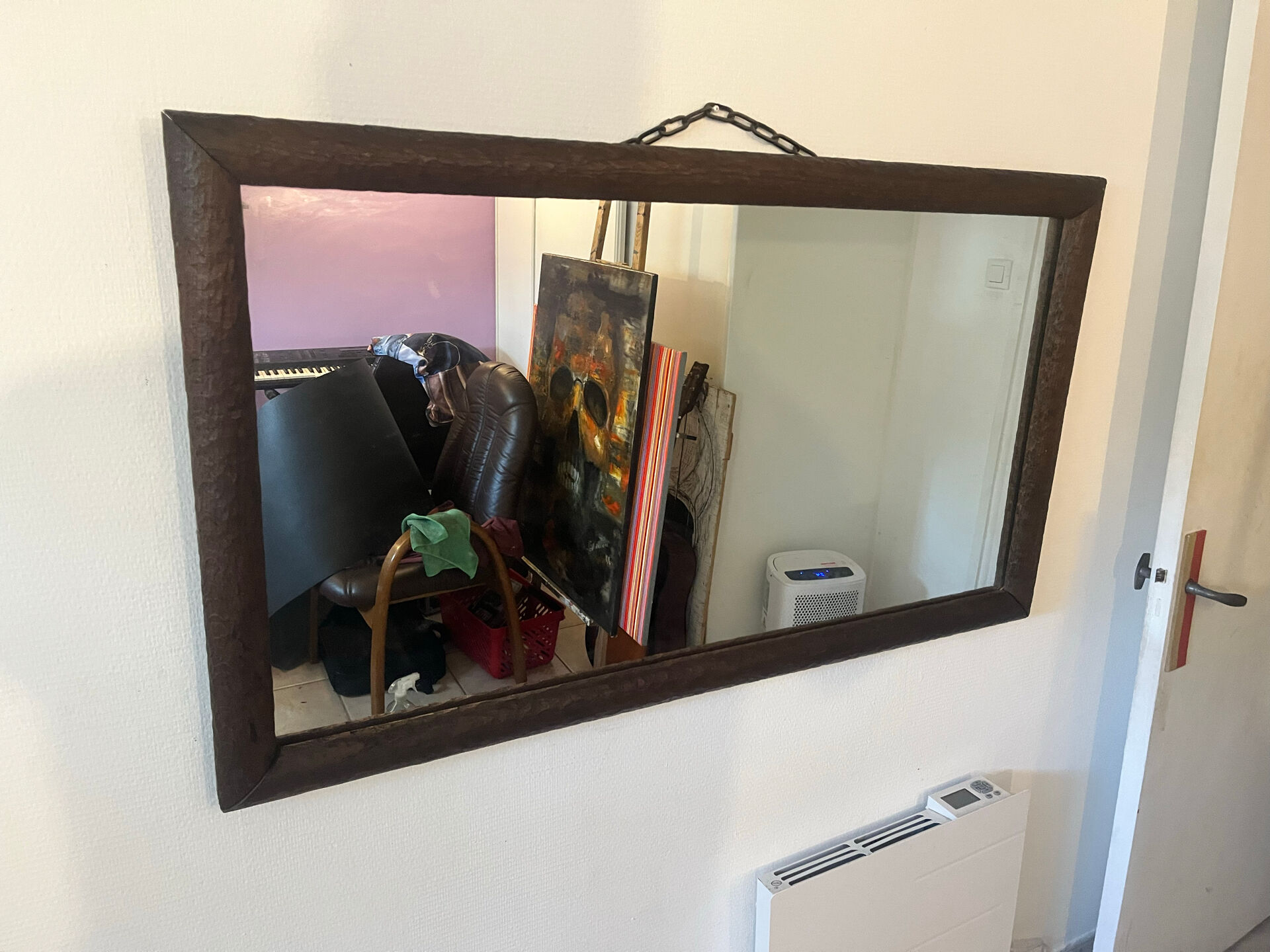 Large vintage mirror with a carved solid wood frame.
