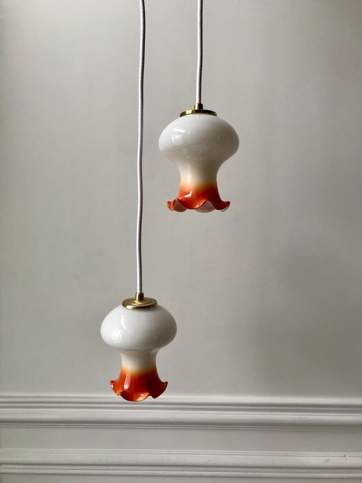 Pair of orange opaline tulips gradient white thread 70s