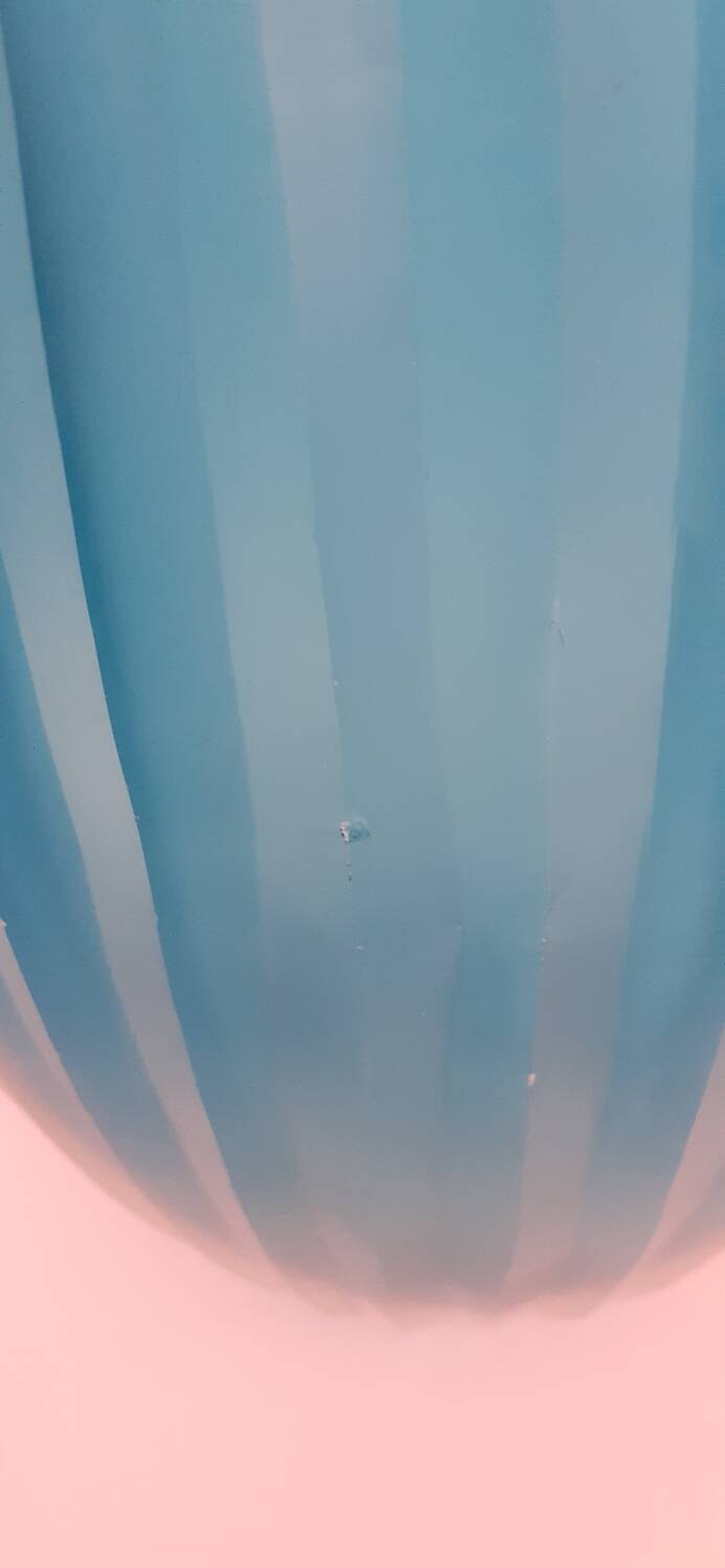 Antique turquoise glass vase