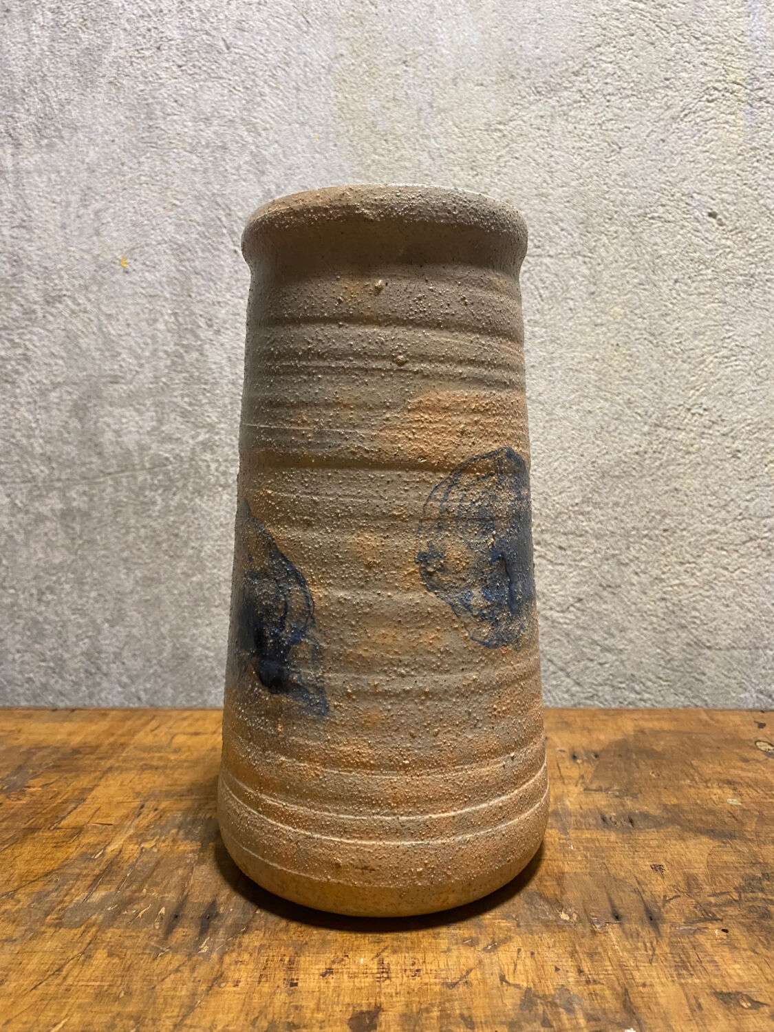 Ceramic vase with blue flowers
