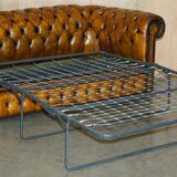 Vintage Chesterfield leather sofa bed, fully restored, circa 1940.