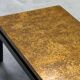 Modernist coffee table with a patinated gold top, 120x52.5x36 cm, mid-20th century.