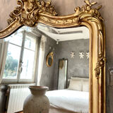 Antique gilded mirror with Louis XV pediment