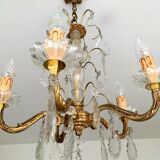 Old Louis XV style chandelier in gilded bronze and crystal