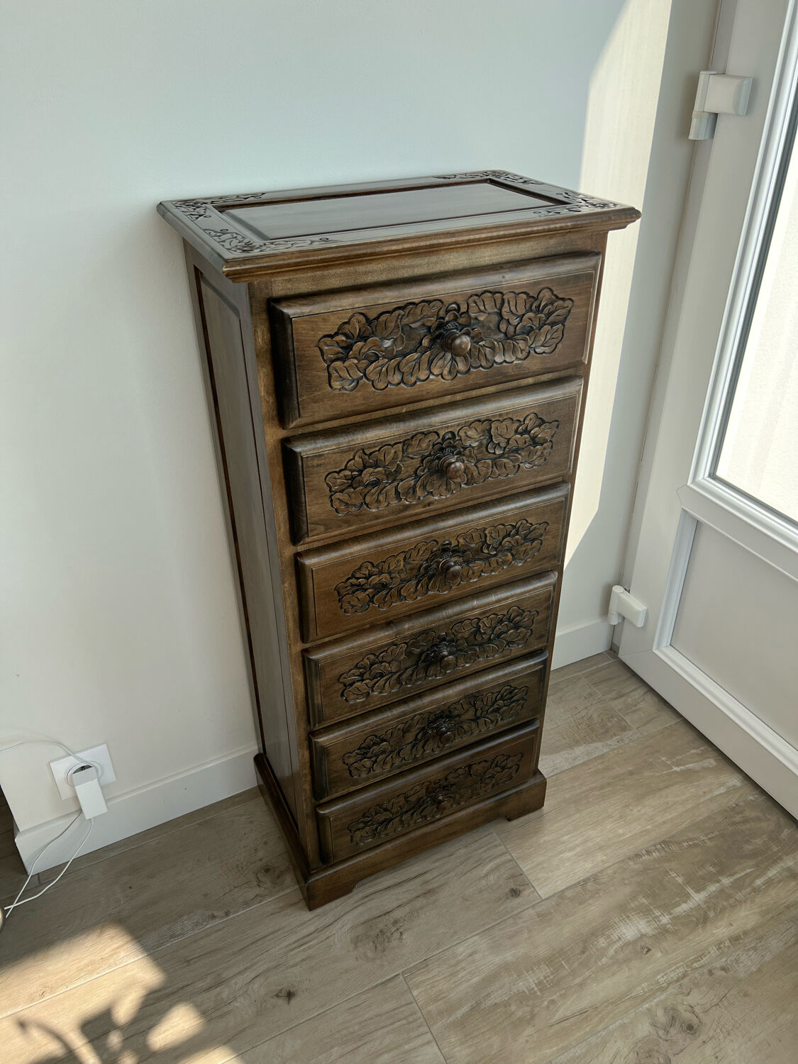 Carved wooden chiffonnier