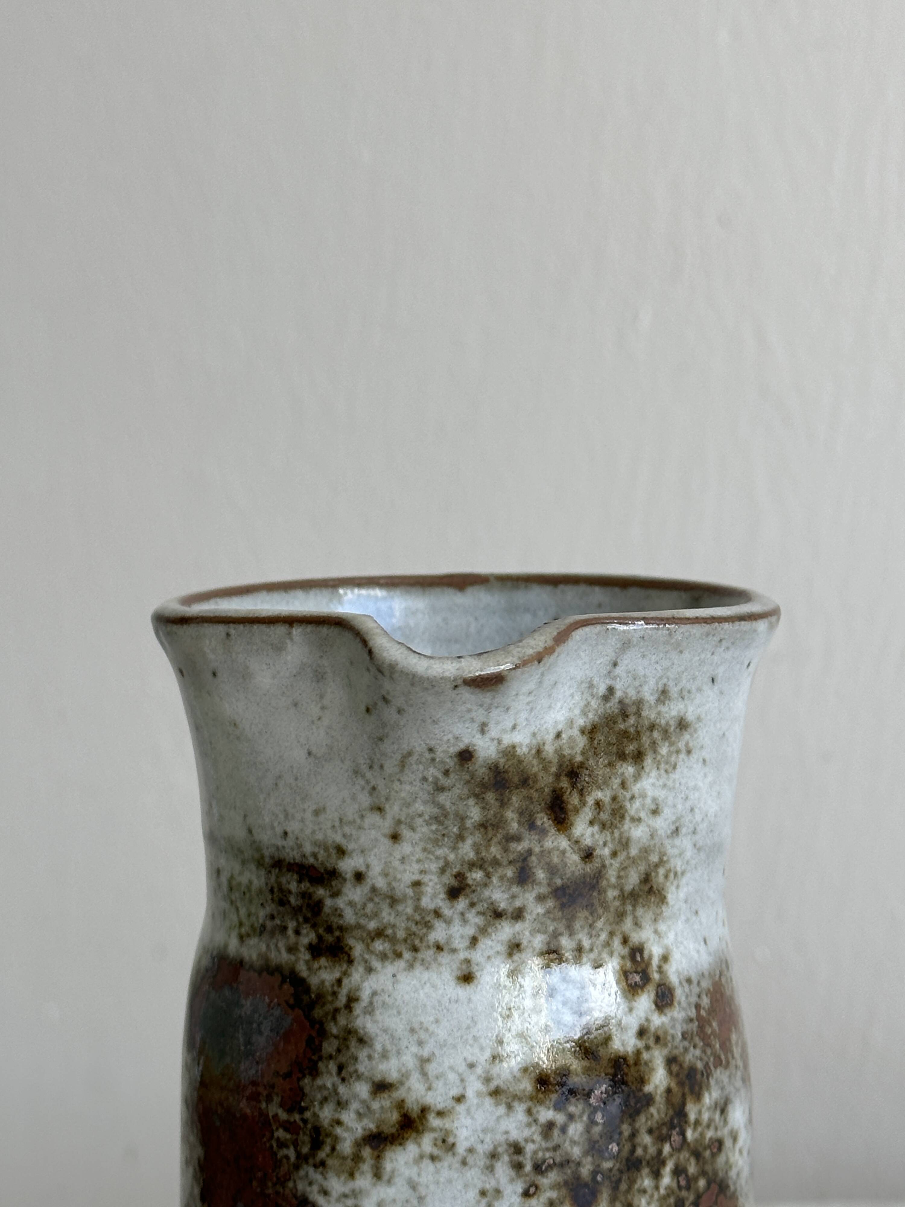 Small sanded stoneware pitcher signed Chantal and Thierry Robert