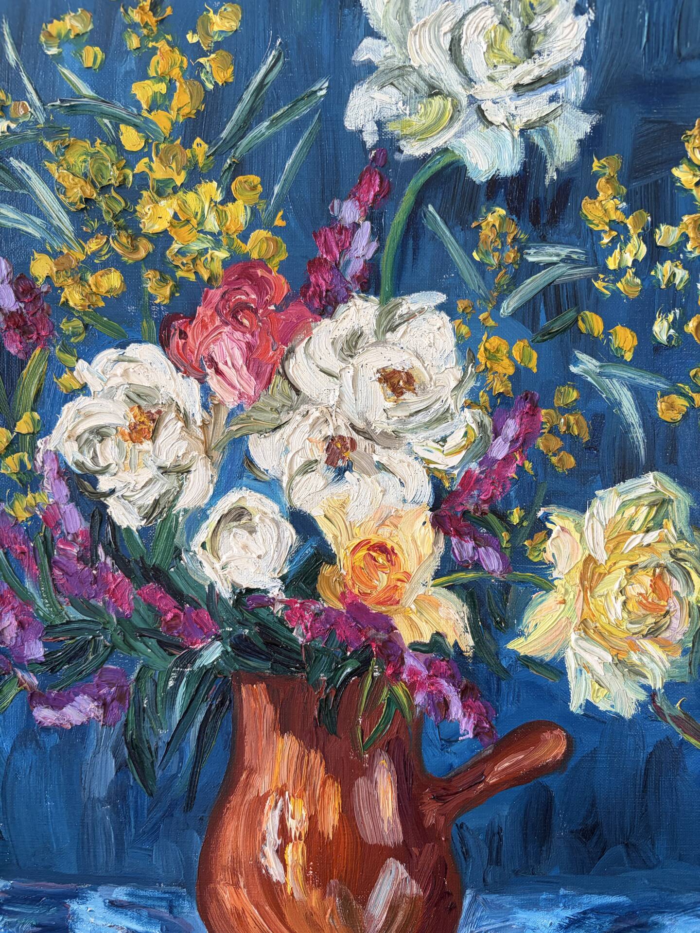 Bouquet on a blue background, oil on canvas signed Gisèle Renaut.