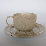 Coffee cup and vintage pyrity sandstone subcup