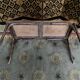 Piano bench in cannage