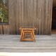 Nesting tables in rattan and glass