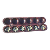 Traditional carved wooden Awalé game Mancala