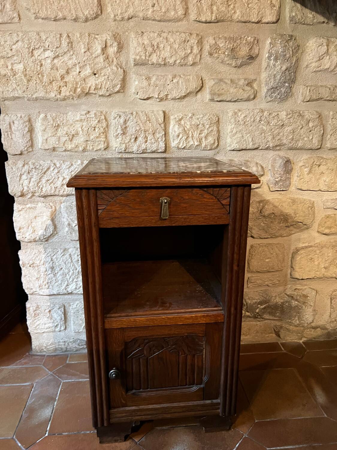 Antique bedside table with marble top