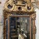 Regency period mirror with a carved and gilded wooden pediment – 18th century