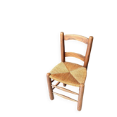 Provençal chair in dark wood and woven straw.