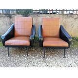 Paire de fauteuils en simili cuir
