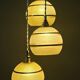 Suspension triple vintage glass globes in frosted yellow and gold.