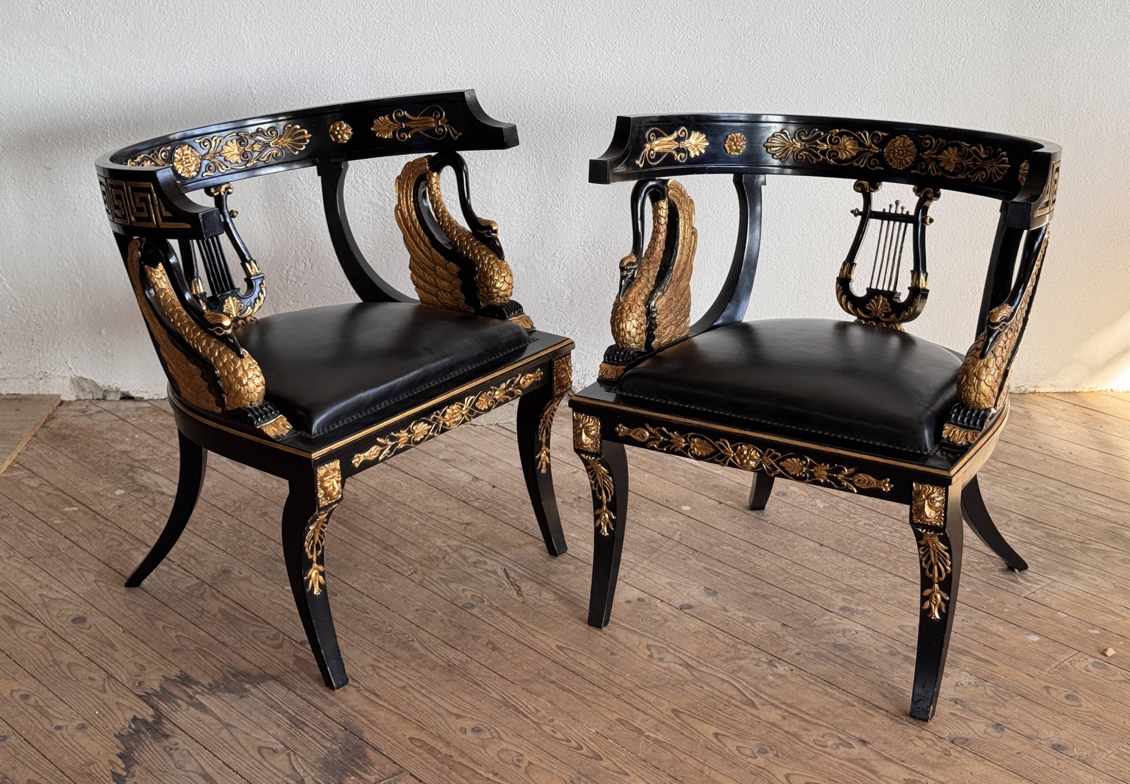 Pair of Empire-style bergère armchairs decorated with swans and lyres